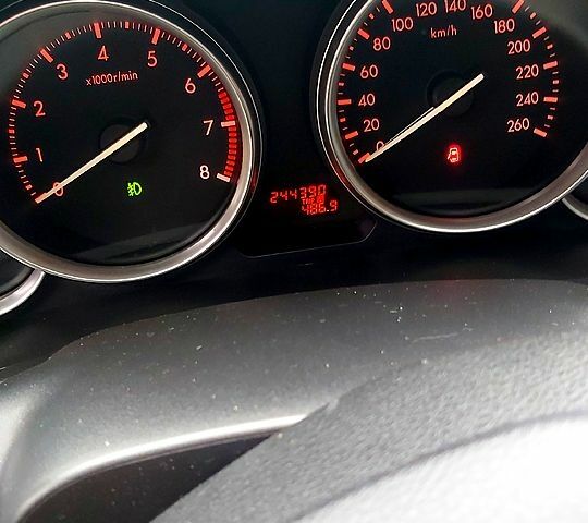 Синий Мазда 6, объемом двигателя 2 л и пробегом 245 тыс. км за 7500 $, фото 1 на Automoto.ua