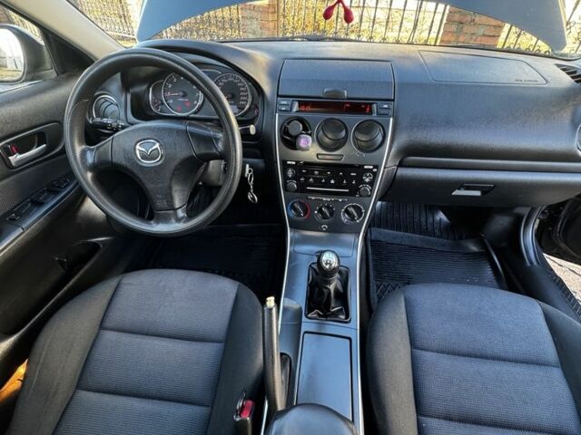 Зеленый Мазда 6, объемом двигателя 1.8 л и пробегом 230 тыс. км за 3950 $, фото 13 на Automoto.ua