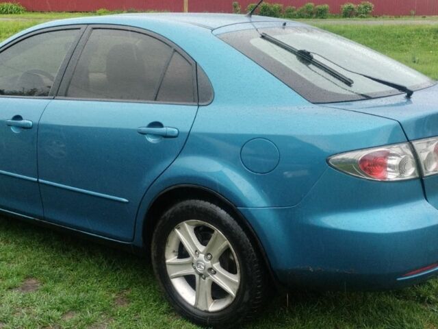 Зелений Мазда 6, об'ємом двигуна 2 л та пробігом 260 тис. км за 4600 $, фото 3 на Automoto.ua