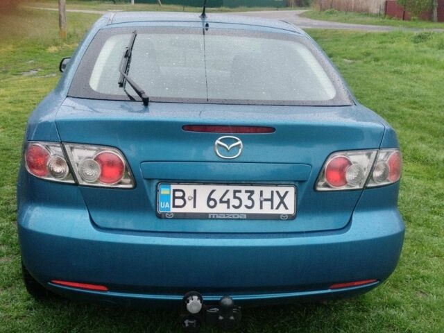 Зелений Мазда 6, об'ємом двигуна 2 л та пробігом 260 тис. км за 4600 $, фото 4 на Automoto.ua