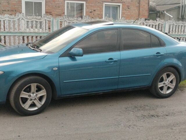 Зелений Мазда 6, об'ємом двигуна 2 л та пробігом 260 тис. км за 4600 $, фото 1 на Automoto.ua