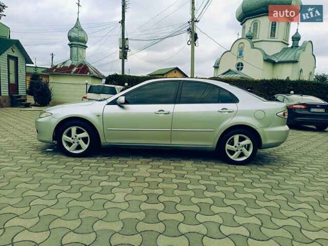Зеленый Мазда 6, объемом двигателя 2 л и пробегом 250 тыс. км за 3550 $, фото 6 на Automoto.ua