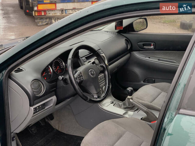 Зеленый Мазда 6, объемом двигателя 1.8 л и пробегом 241 тыс. км за 3950 $, фото 16 на Automoto.ua