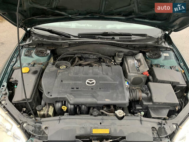 Зеленый Мазда 6, объемом двигателя 1.8 л и пробегом 241 тыс. км за 3950 $, фото 19 на Automoto.ua