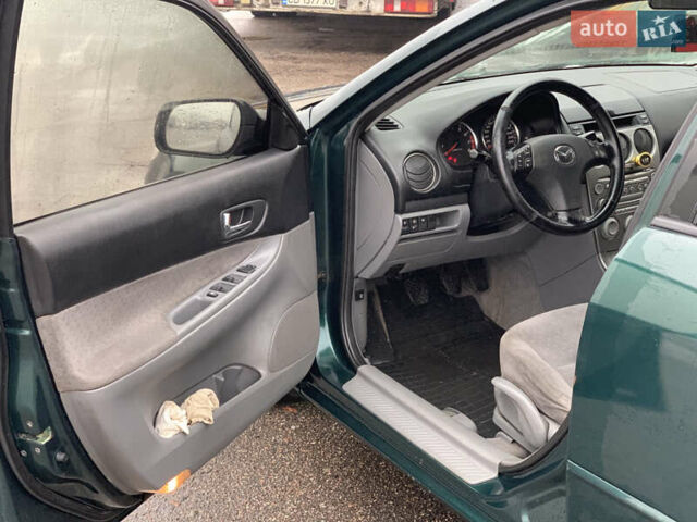 Зеленый Мазда 6, объемом двигателя 1.8 л и пробегом 241 тыс. км за 3950 $, фото 17 на Automoto.ua