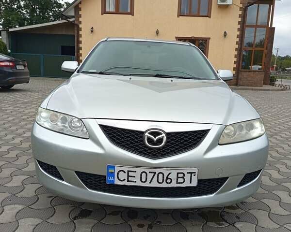 Зеленый Мазда 6, объемом двигателя 2 л и пробегом 250 тыс. км за 3550 $, фото 4 на Automoto.ua