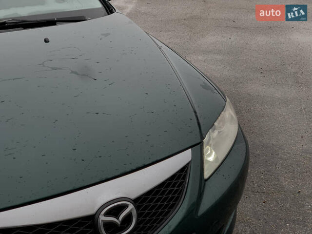 Зеленый Мазда 6, объемом двигателя 1.8 л и пробегом 241 тыс. км за 3950 $, фото 11 на Automoto.ua