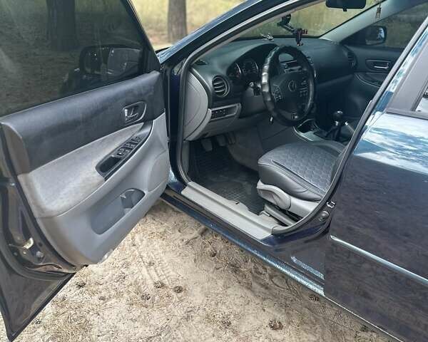 Зеленый Мазда 6, объемом двигателя 2 л и пробегом 375 тыс. км за 4500 $, фото 4 на Automoto.ua