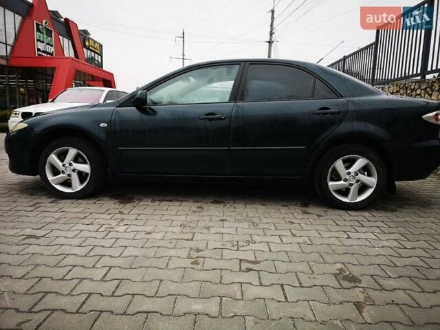 Зеленый Мазда 6, объемом двигателя 2 л и пробегом 248 тыс. км за 4350 $, фото 7 на Automoto.ua