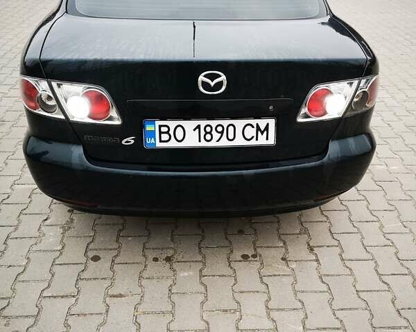 Зеленый Мазда 6, объемом двигателя 2 л и пробегом 248 тыс. км за 4350 $, фото 2 на Automoto.ua