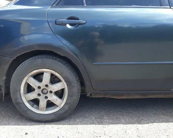 Зелений Мазда 6, об'ємом двигуна 1.8 л та пробігом 300 тис. км за 3000 $, фото 5 на Automoto.ua