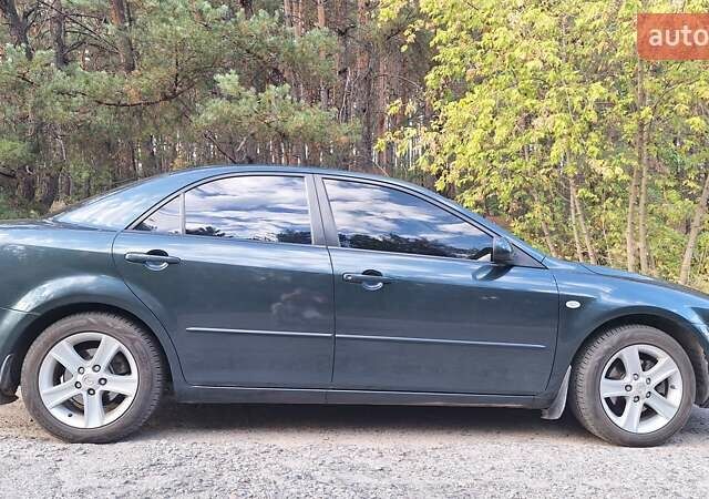 Зелений Мазда 6, об'ємом двигуна 2 л та пробігом 276 тис. км за 4950 $, фото 3 на Automoto.ua