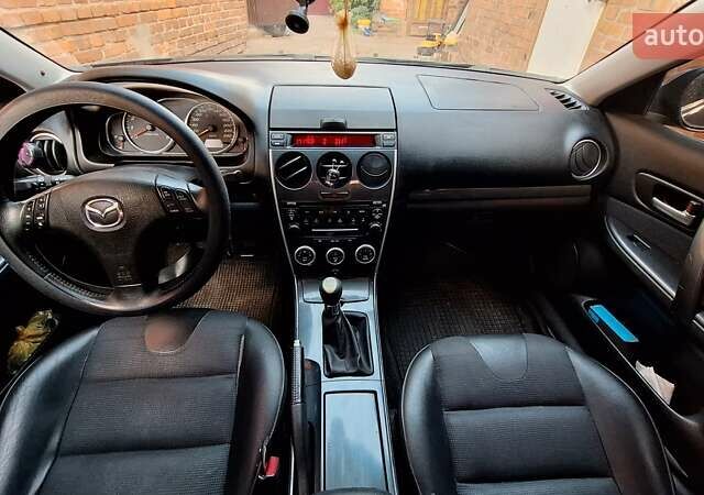 Зелений Мазда 6, об'ємом двигуна 2 л та пробігом 276 тис. км за 4950 $, фото 7 на Automoto.ua
