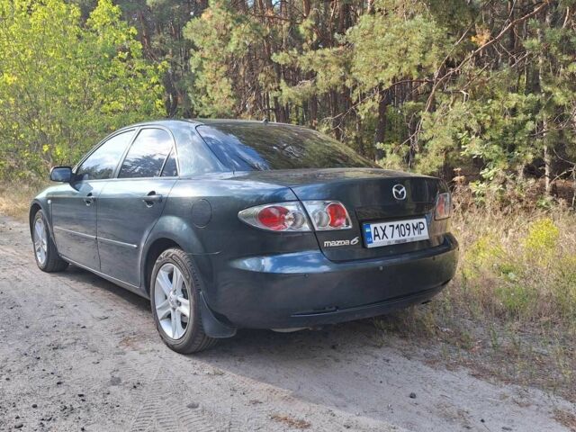 Зеленый Мазда 6, объемом двигателя 2 л и пробегом 276 тыс. км за 4950 $, фото 1 на Automoto.ua