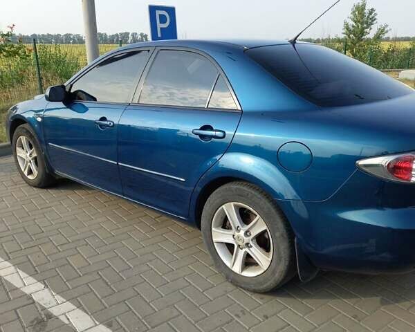 Зелений Мазда 6, об'ємом двигуна 2 л та пробігом 268 тис. км за 5550 $, фото 2 на Automoto.ua