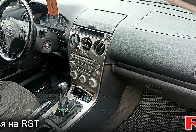 Зелений Мазда 6, об'ємом двигуна 2 л та пробігом 358 тис. км за 3580 $, фото 4 на Automoto.ua
