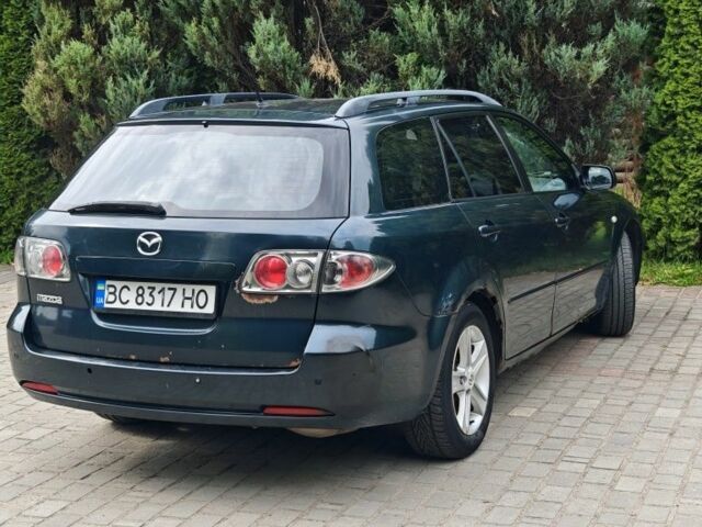 Зелений Мазда 6, об'ємом двигуна 1.8 л та пробігом 460 тис. км за 2312 $, фото 11 на Automoto.ua