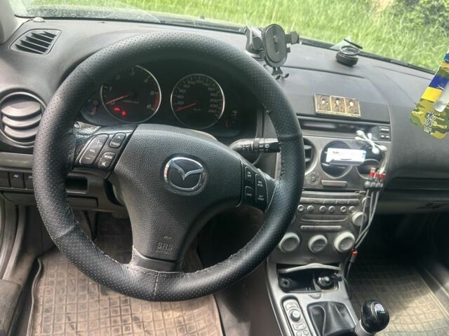Зелений Мазда 6, об'ємом двигуна 2 л та пробігом 357 тис. км за 4200 $, фото 5 на Automoto.ua