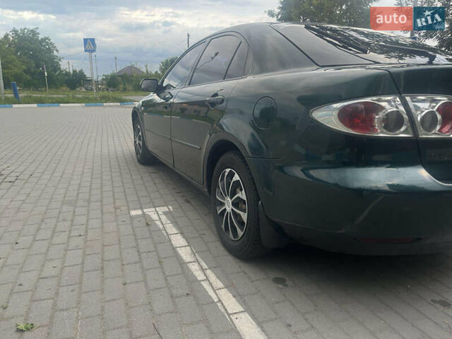 Зеленый Мазда 6, объемом двигателя 2 л и пробегом 385 тыс. км за 2750 $, фото 5 на Automoto.ua