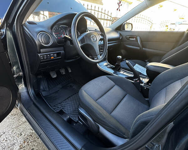 Зеленый Мазда 6, объемом двигателя 1.8 л и пробегом 230 тыс. км за 3950 $, фото 14 на Automoto.ua