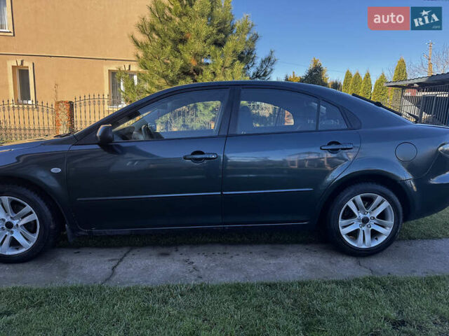 Зеленый Мазда 6, объемом двигателя 1.8 л и пробегом 230 тыс. км за 3950 $, фото 2 на Automoto.ua