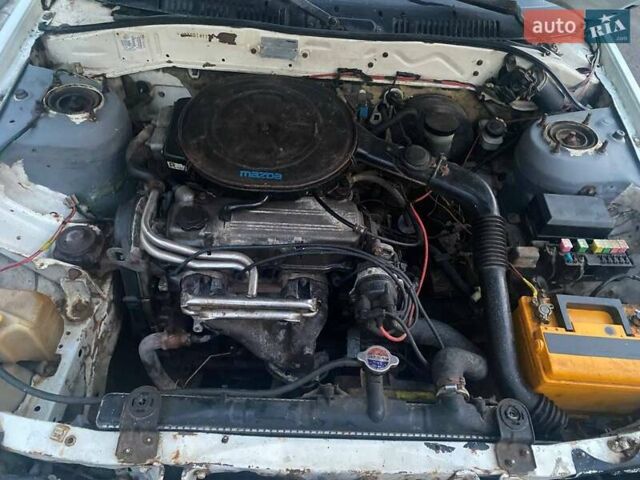 Білий Мазда 626, об'ємом двигуна 2 л та пробігом 250 тис. км за 700 $, фото 5 на Automoto.ua