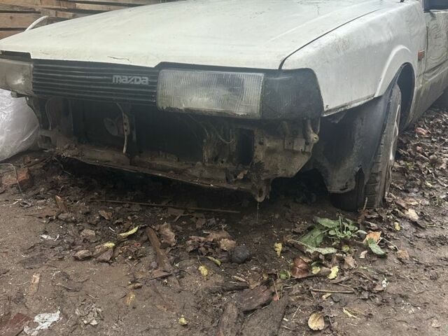 Белый Мазда 626, объемом двигателя 2 л и пробегом 400 тыс. км за 500 $, фото 1 на Automoto.ua