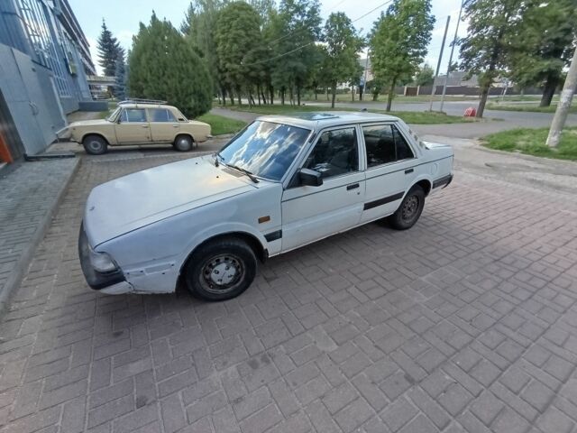 Белый Мазда 626, объемом двигателя 0 л и пробегом 400 тыс. км за 309 $, фото 1 на Automoto.ua