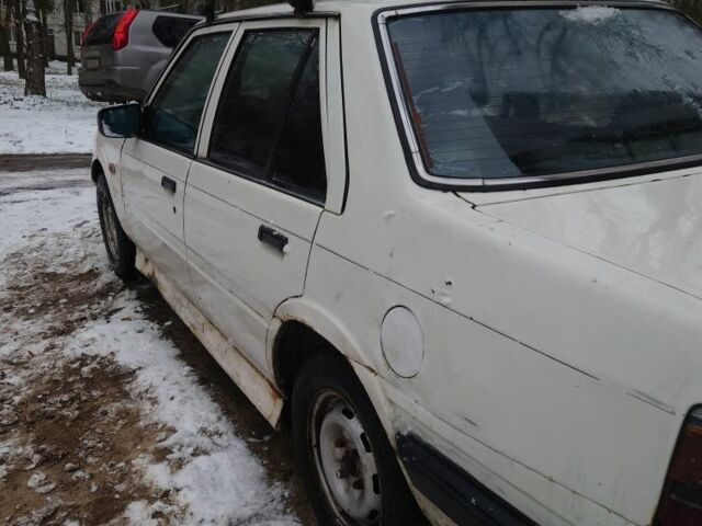 Белый Мазда 626, объемом двигателя 2 л и пробегом 350 тыс. км за 356 $, фото 9 на Automoto.ua