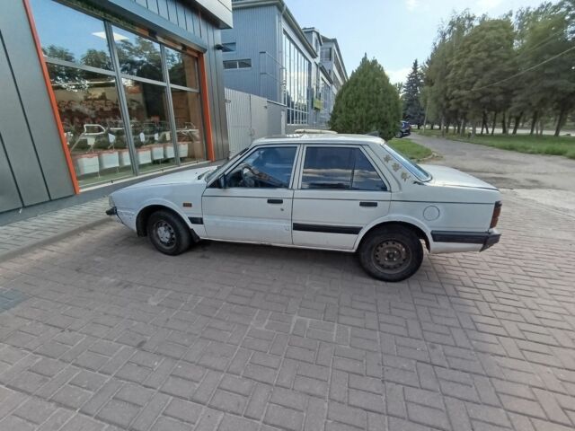 Белый Мазда 626, объемом двигателя 0 л и пробегом 400 тыс. км за 309 $, фото 5 на Automoto.ua