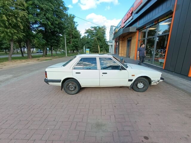 Белый Мазда 626, объемом двигателя 0 л и пробегом 400 тыс. км за 309 $, фото 3 на Automoto.ua