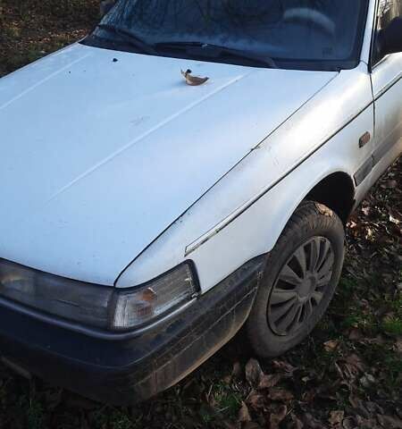 Белый Мазда 626, объемом двигателя 2 л и пробегом 330 тыс. км за 1300 $, фото 9 на Automoto.ua