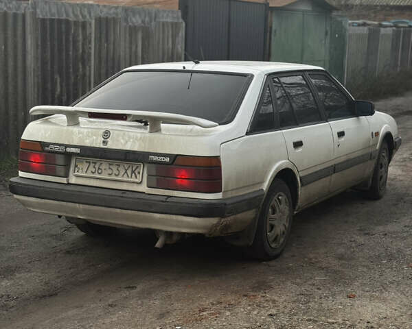 Белый Мазда 626, объемом двигателя 1.6 л и пробегом 380 тыс. км за 1300 $, фото 5 на Automoto.ua