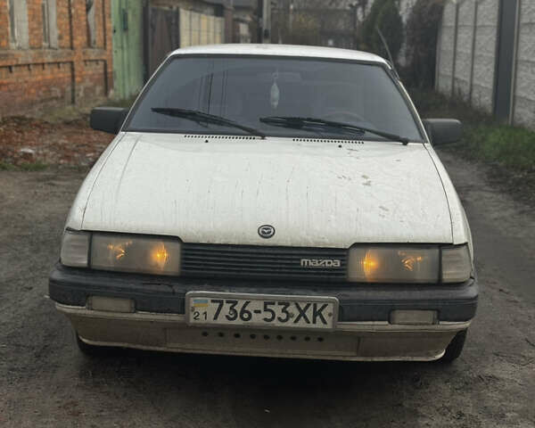 Белый Мазда 626, объемом двигателя 1.6 л и пробегом 380 тыс. км за 1300 $, фото 1 на Automoto.ua
