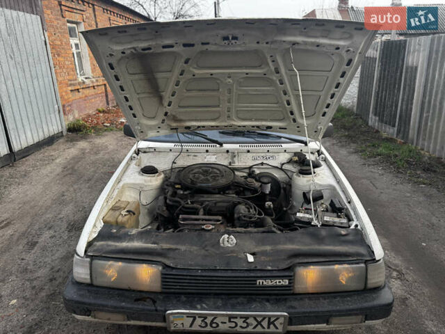 Белый Мазда 626, объемом двигателя 1.6 л и пробегом 380 тыс. км за 1300 $, фото 18 на Automoto.ua