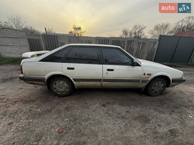 Белый Мазда 626, объемом двигателя 1.6 л и пробегом 380 тыс. км за 1300 $, фото 6 на Automoto.ua