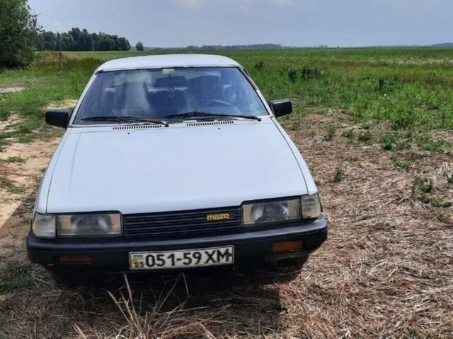 Белый Мазда 626, объемом двигателя 2 л и пробегом 200 тыс. км за 1500 $, фото 5 на Automoto.ua