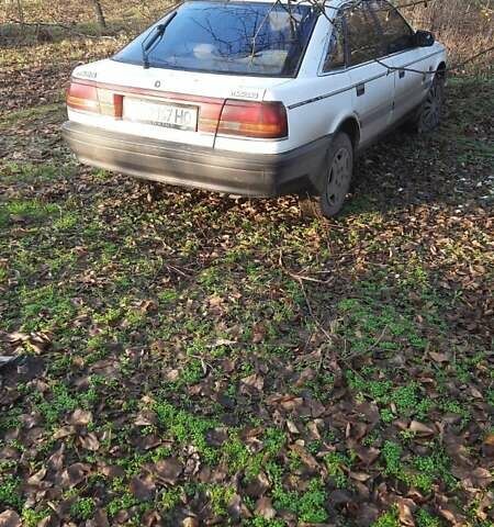 Белый Мазда 626, объемом двигателя 2 л и пробегом 330 тыс. км за 1300 $, фото 3 на Automoto.ua