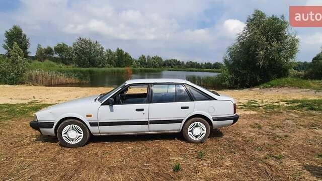 Белый Мазда 626, объемом двигателя 2 л и пробегом 200 тыс. км за 1500 $, фото 2 на Automoto.ua