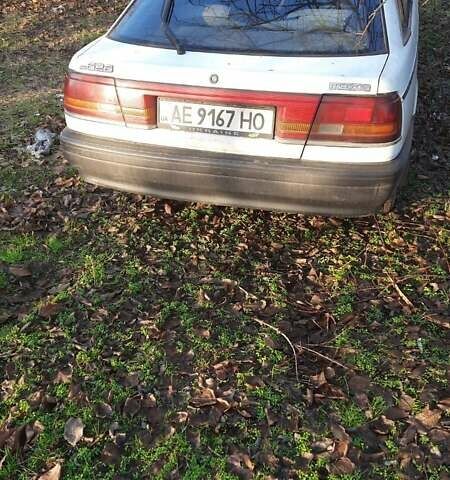 Белый Мазда 626, объемом двигателя 2 л и пробегом 330 тыс. км за 1300 $, фото 2 на Automoto.ua