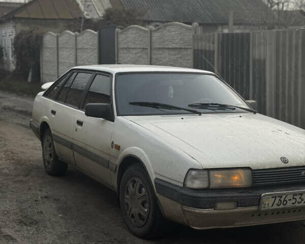 Белый Мазда 626, объемом двигателя 1.6 л и пробегом 380 тыс. км за 1300 $, фото 7 на Automoto.ua