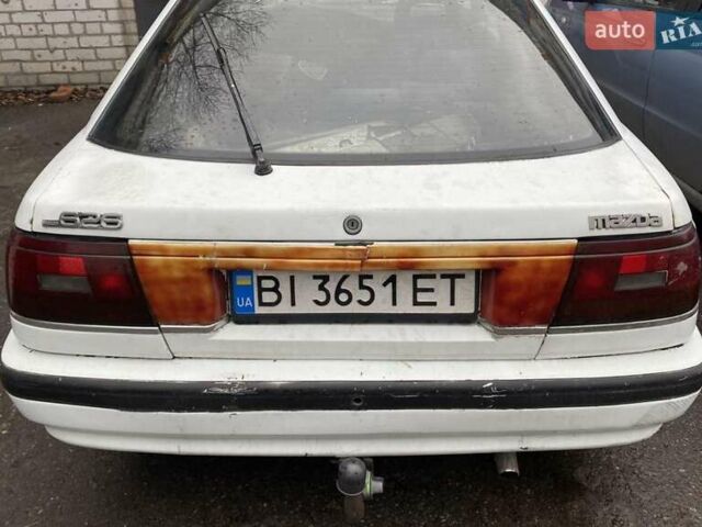 Белый Мазда 626, объемом двигателя 2 л и пробегом 400 тыс. км за 600 $, фото 2 на Automoto.ua