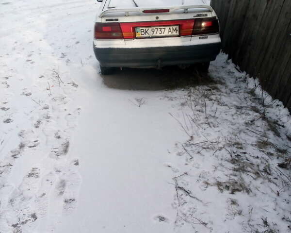 Білий Мазда 626, об'ємом двигуна 2 л та пробігом 320 тис. км за 1100 $, фото 6 на Automoto.ua