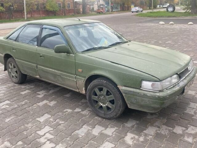 Белый Мазда 626, объемом двигателя 2 л и пробегом 722 тыс. км за 716 $, фото 3 на Automoto.ua