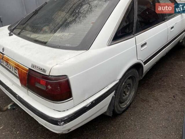 Белый Мазда 626, объемом двигателя 2 л и пробегом 400 тыс. км за 600 $, фото 3 на Automoto.ua