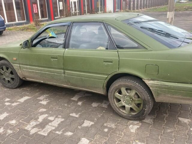 Белый Мазда 626, объемом двигателя 2 л и пробегом 722 тыс. км за 716 $, фото 1 на Automoto.ua