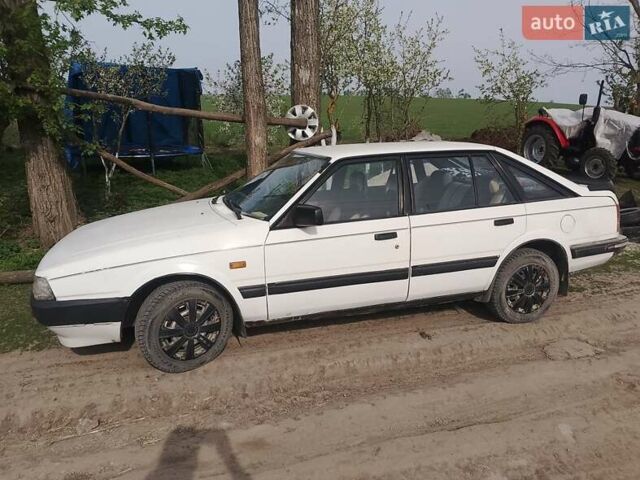 Белый Мазда 626, объемом двигателя 0 л и пробегом 360 тыс. км за 1000 $, фото 1 на Automoto.ua