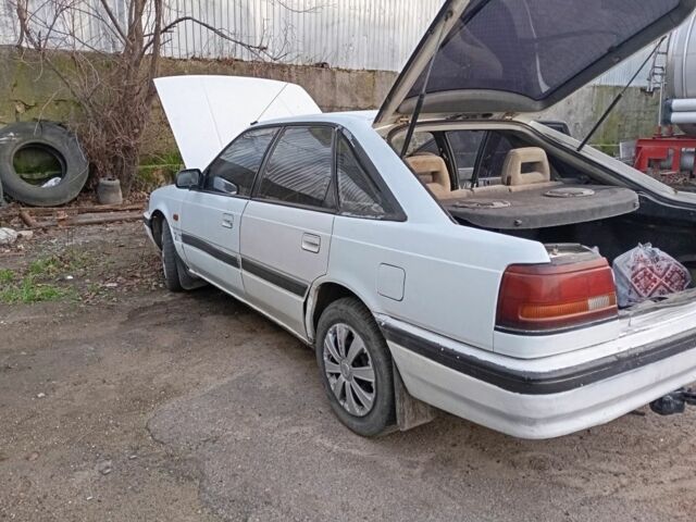 Белый Мазда 626, объемом двигателя 0 л и пробегом 360 тыс. км за 1000 $, фото 1 на Automoto.ua