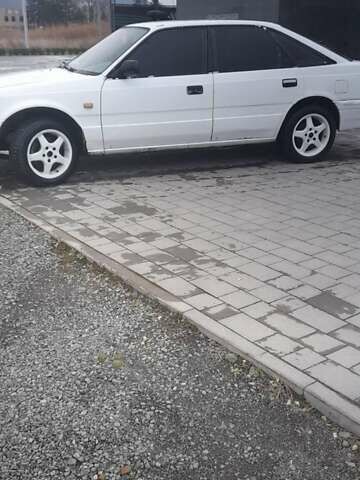 Белый Мазда 626, объемом двигателя 2 л и пробегом 323 тыс. км за 900 $, фото 5 на Automoto.ua