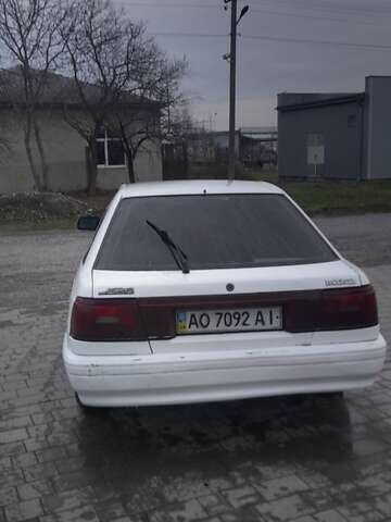 Белый Мазда 626, объемом двигателя 2 л и пробегом 323 тыс. км за 900 $, фото 2 на Automoto.ua